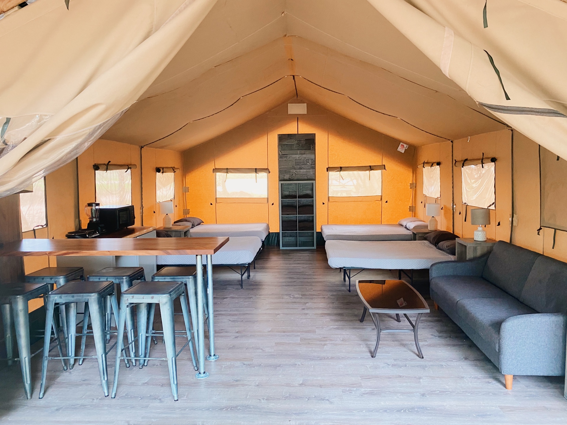 Glamping cabin at Son's River Ranch surrounded by trees