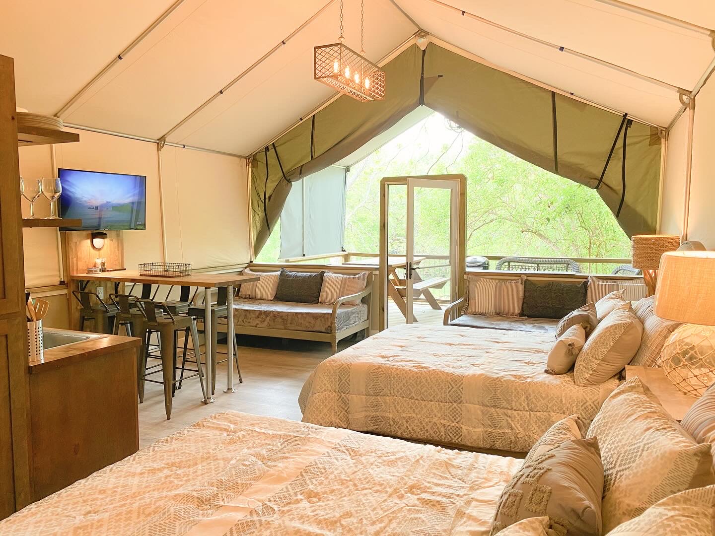 Son's Geronimo glamping tent interior with beds
